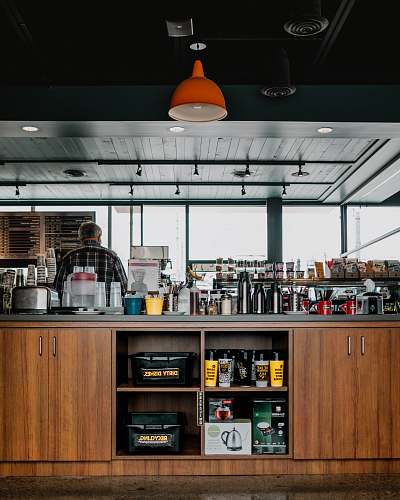 heine brothers' - hikes point man standing on the kitchen inside the room louisville